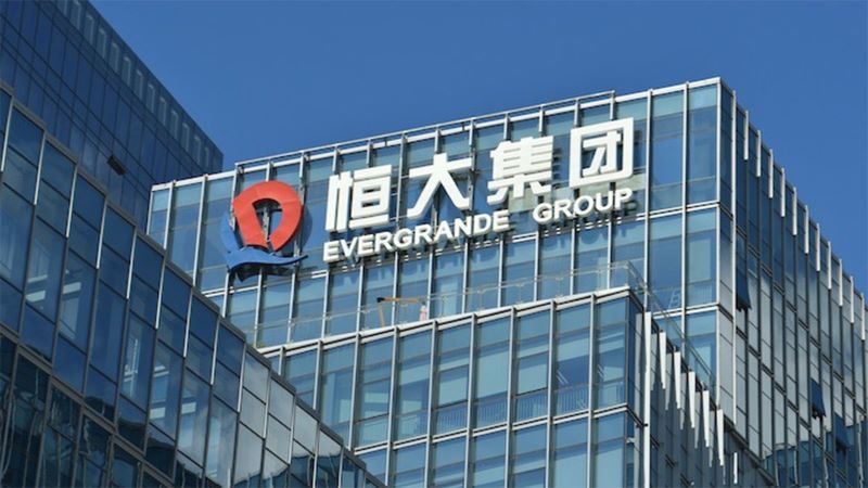 Evergrande misses payment, shares plummet