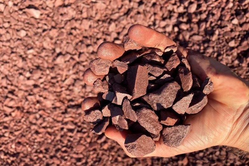 How did iron ore prices close the week in global markets?