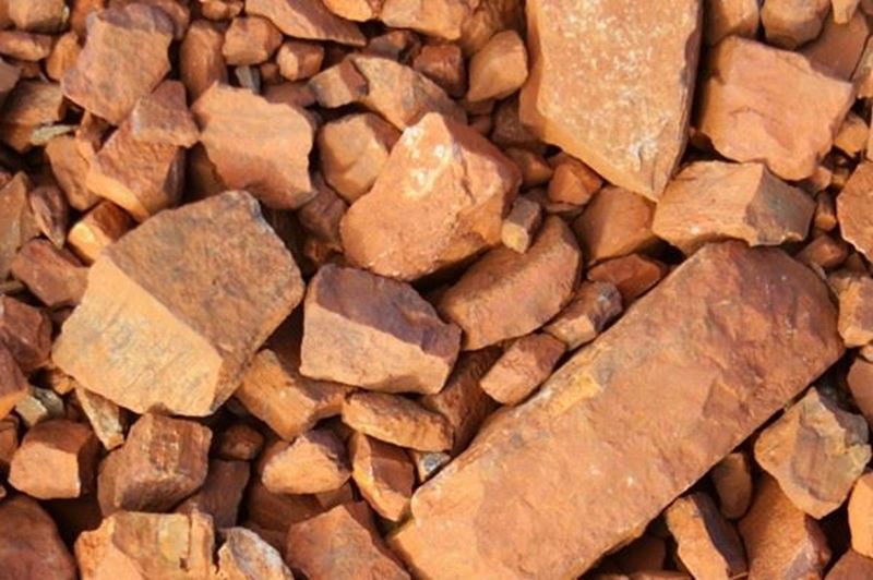 How does the increase in iron ore stock affect the steel supply chain?